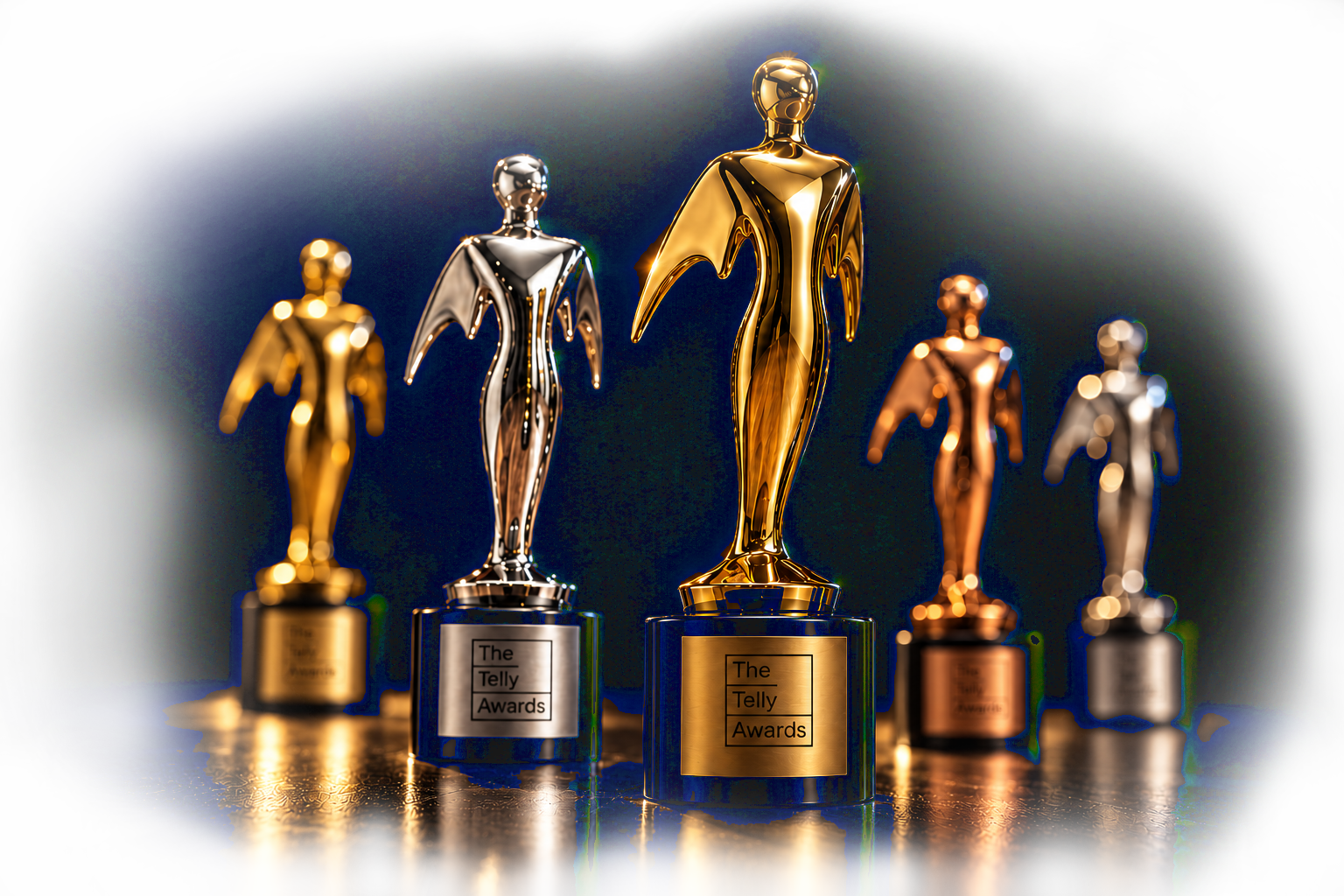 Telly award statuettes with dramatic lighting and reflections